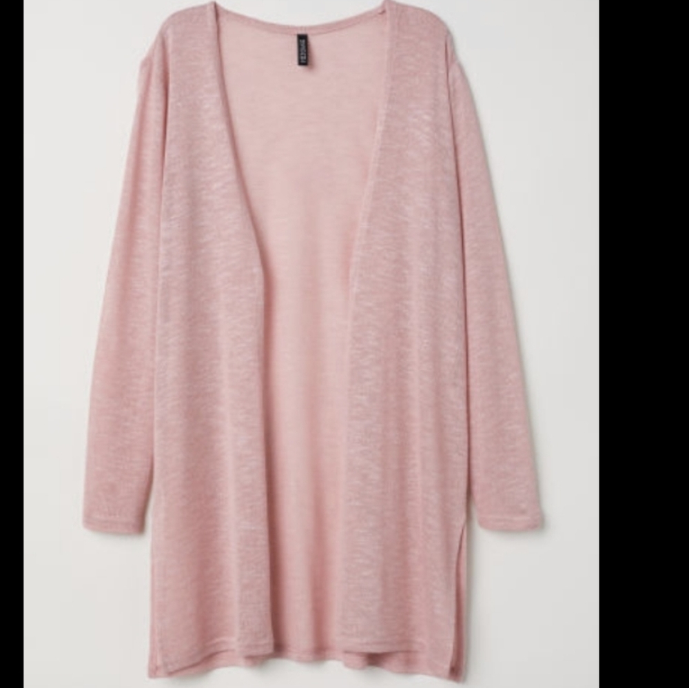 A soft pink fine knit cardigan
